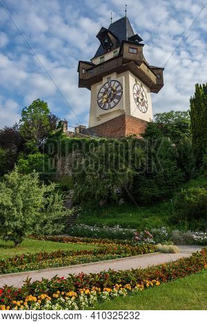 The Famous Clock Tower (grazer Uhrturm) And Gardens On Schlossberg Hill, Graz, Styria Region, Austri