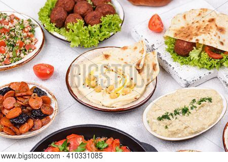 Traditional Jewish Food. Hummus, Falafel, Shakshuka, Tsimes, Forshmak And Pita