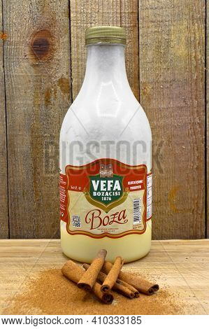 Vefa Bozasi Bottle, Boza And Cinnamon Sticks, Traditional Turkish Cuisine Drinks, On Wooden Bamboo B