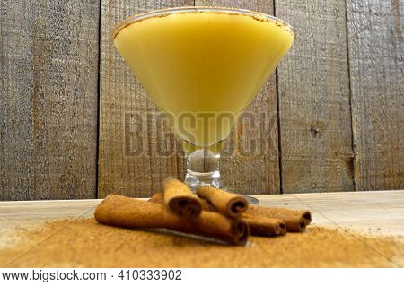 Boza And Cinnamon Sticks, Traditional Turkish Cuisine Drinks, On Wooden Bamboo Background