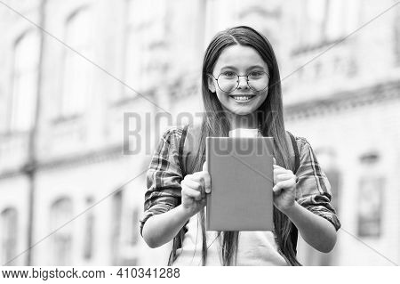 Book Is Just Waiting For You. Happy Child Show Book Cover. School Library. Literature Lesson. Readin