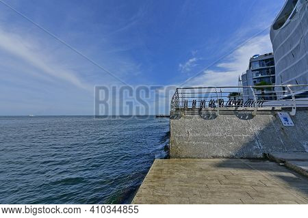 Ukraine, Odessa 07/27/2020. Lanzheron Beach. A Picturesque Embankment With Palm Trees, Fountains, Ge