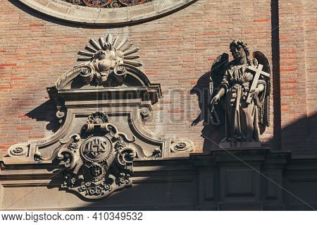 Sculpture Of Angel With Cross In Hand . Ornamental Statues Of Catholic Cathedral