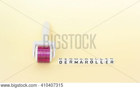 White Roller With Mesotherapy Handle And The Inscription 