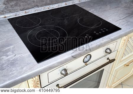 Modern Kitchen Luxurious Interior With Black Induction Or Electric Hob Stove Cooker With Ceramic Top