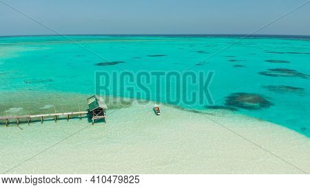 Tropical Island In The Ocean With Palm Trees On White Sand Beach. Onok Island, Balabac, Philippines.
