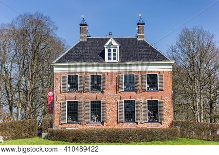 Midwolda, Netherlands - April 11, 2020: Facade Of The Historic Mansion Ennemaborg In Midwolda, Nethe