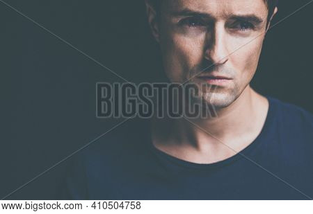 Young man suffering from anxiety, depression due to social seclusion, isolation, COVID induced lockdown