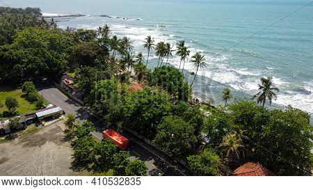 Aerial View Of Karang Bolong Beach And Its Wonderful Sunset View. At Anyer Beach With Noise Cloud An