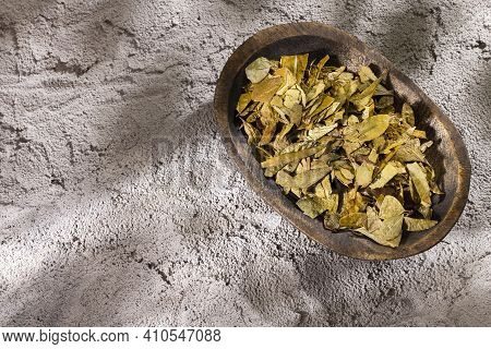 Dried Medicinal Coca Leaves In The Wooden Bowl - Erythroxylum Coca