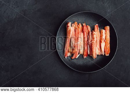 Crab Meat On A Black Plate Black Background Isolated