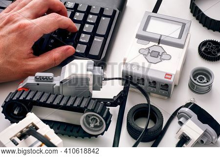Tambov, Russian Federation - December 25, 2019 Person Hand On Keyboard Coding Lego Mindstorms Ev3 Ro