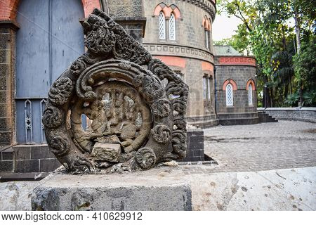Picture Of Ruined Ancient Grey Stone Carving Of Hindu God And Goddess In Town Hall Kolhapur City Ind