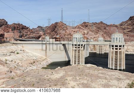 View Of The Penstock Towers Over Lake Mead At Hoover Dam, Between Arizona And Nevada States, Usa.