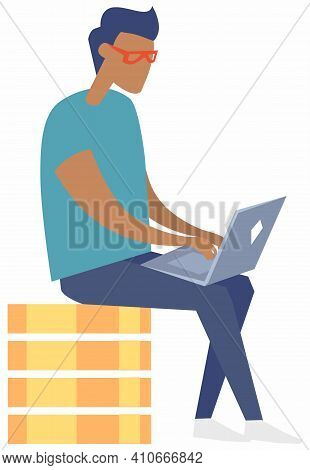 Young Man With Laptop Sitting On Stack Of Golden Coins, Makes Online Purchases, Earns Money Mining C