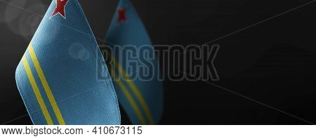 Small National Flags Of The Aruba On A Dark Background