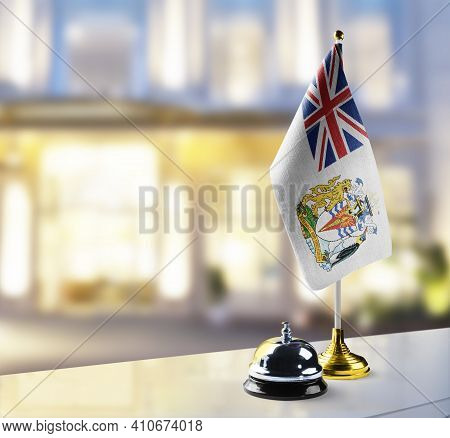 British Antarctic Territory Flag On The Reception Desk In The Lobby Of The Hotel