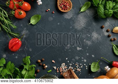 Food Cooking Background. Fresh Rosemary, Cilantro, Basil, Cherry Tomatoes, Peppers And Olive Oil, Sp