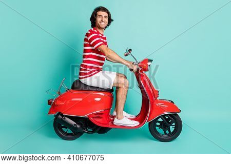 Profile Side View Portrait Of Handsome Cheery Guy Driving Moped Highway Isolated Over Bright Green T