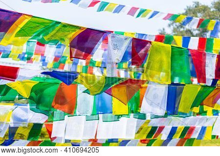 Colorful Prayer Flags. Tibetan Prayer Flags With Buddhist Scripts.