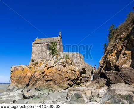Mont Saint Michel, France - August 29, 2019: Saint Aubert's Chapel Is A The Tiny Sanctuary By Mont S