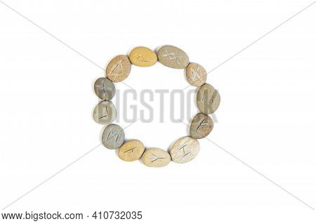 Rune Stones Arranged In Circle On White Background