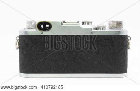 DUSSELDORF, GERMANY - FEBRUARY, 2021: Back view of famous 35mm film camera Leica IIIc isolated on white background