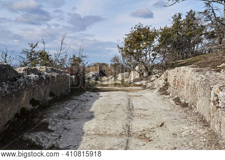 Ancient Road With Ruts From Carts In Stone To The Ruins Of The Medieval City Of Chufut-kale, Crimea