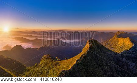Phu Chi Dao At Sunrise In Chiang Rai, Thailand.