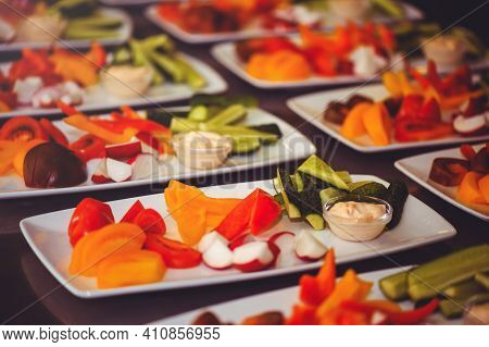 Fresh Vegetable Salad With Radish, Cucumber, Bell Pepper, Tomatoes And Herbs In A Ceramic Bowl Resta