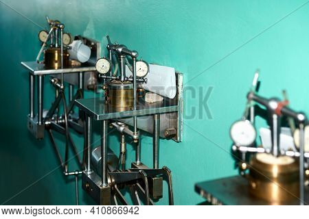 Several Old-style Compression Devices Attached To The Wall. Selective Focus.