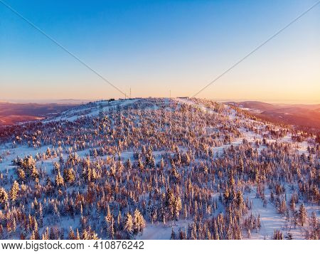 Colorful Winter Sunset In Sheregesh Ski Resort Mountains With Clouds. Aerial Top View Forest Russia