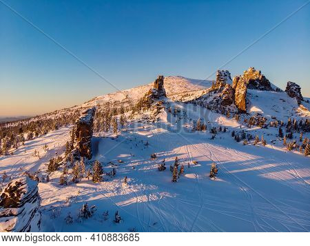 Colorful Winter Sunset In Sheregesh Ski Resort Mountains With Clouds. Aerial Top View Forest Russia