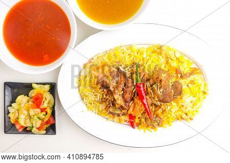 A picture of mandy lamb rice serve on the table