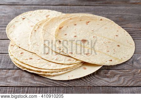 Mexican Corn Tortillas For Sentencing Tacos, Quesadilla, Fajitos, Tortilla On A Wooden Table