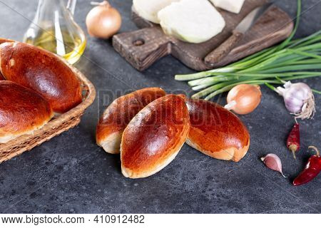 Russian Pastries (pirogi) Filled With Eggs And Green Onion