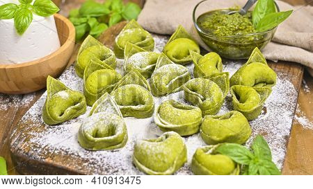 Tortellini E Tortelloni Typical Dishes Emilia Italy. Food Background With Homemade Raw Italian Torte