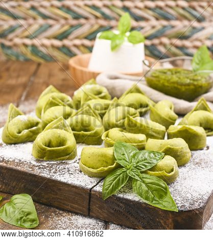 Tortellini E Tortelloni Typical Dishes Emilia Italy. Food Background With Homemade Raw Italian Torte