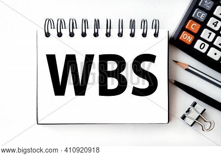 Wbs, Acronyms Business Concept. Text On White Notepad Paper On Light Background