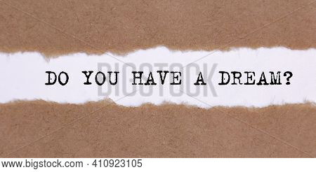The Do You Have A Dream Appearing Behind Ripped Brown Paper.
