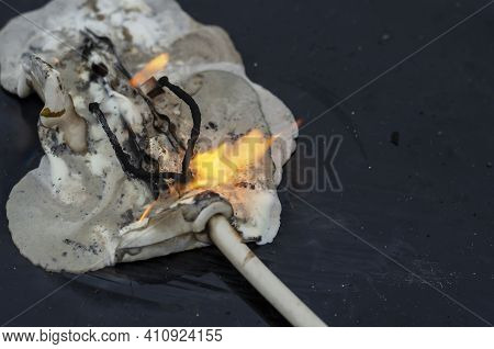 The Concept Of A Household Appliance Fire. The Final Stage Of Extension Cord Fire Due To A Short Cir