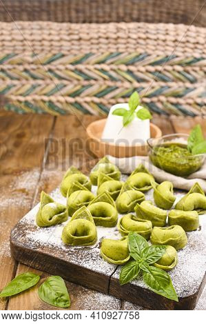 Tortellini E Tortelloni Typical Dishes Emilia Italy. Food Background With Homemade Raw Italian Torte
