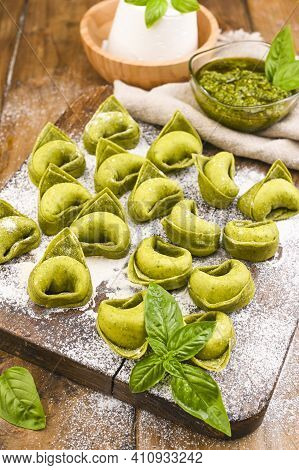 Tortellini E Tortelloni Typical Dishes Emilia Italy. Food Background With Homemade Raw Italian Torte