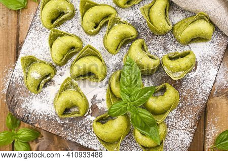 Tortellini E Tortelloni Typical Dishes Emilia Italy. Food Background With Homemade Raw Italian Torte