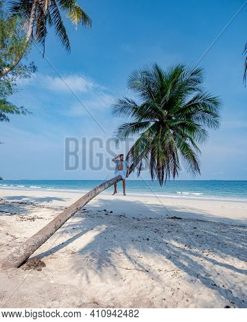 Couple On Vacation In Thailand, Chumpon Province, White Tropical Beach With Palm Trees, Wua Laen Bea