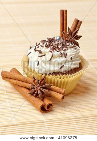 Chocolate Cupcake With Whipped Cream And Cinnamon