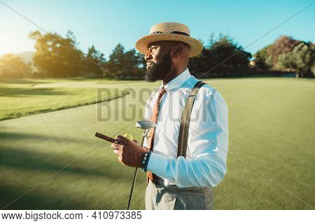 A Portrait Of A Handsome Dapper Bearded Black Man In An Elegant Outfit: White Shirt, Trousers With S