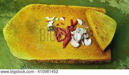 Traditional Grinding Whole Spices On Grindstone In India