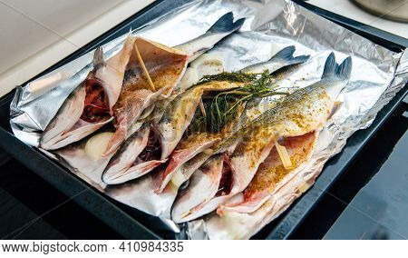 Home Coocing - View From Above Of Three Bass Lateolabrax Japonicus Fish Ready Stove Oven Seasoned Wi
