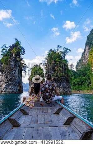 Couple On Longtail Boat Visiting Khao Sok National Park In Phangnga Thailand, Khao Sok National Park
